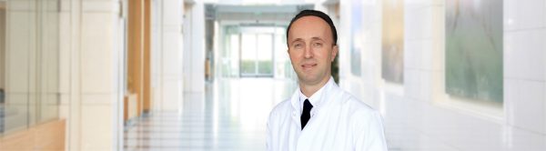 доц. д-р Илкер Тънай